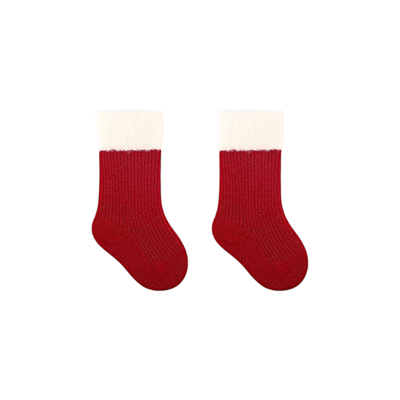 Pair of red baby socks with soft white fluffy cuffs, cozy Christmas Santa-style design.
