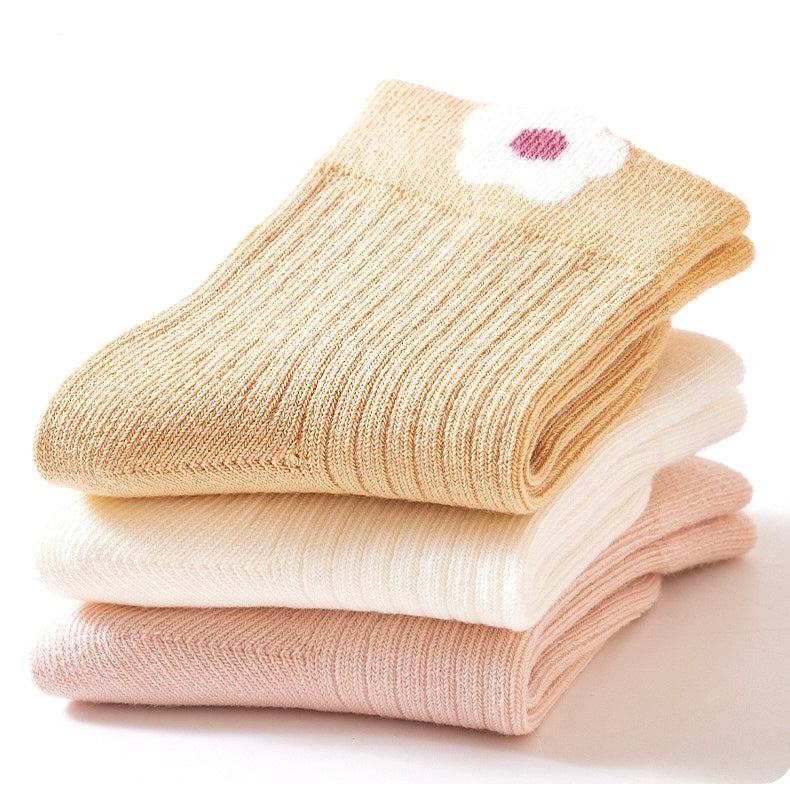 Floral cotton baby socks in multiple pastel colours with delicate embroidery