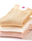 Floral cotton baby socks in multiple pastel colours with delicate embroidery