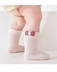 Baby wearing pink floral embroidered socks – cotton socks for babies