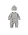 Gray cable knit baby romper with matching hat, soft cotton knit jumpsuit for newborns and infants.