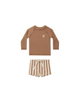 brown kids palm rash guard swim set with long sleeve top and striped swim shorts
