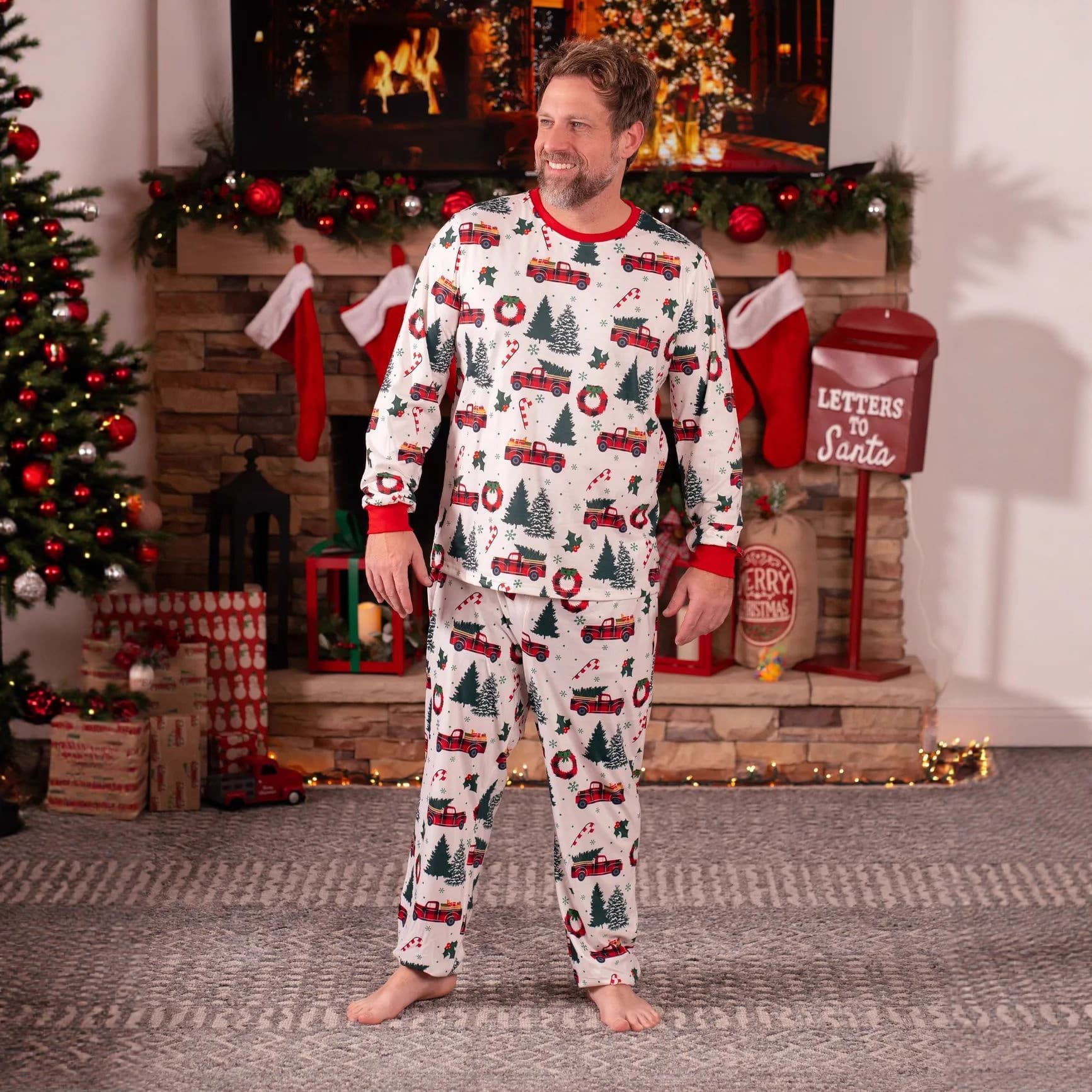 Men’s Christmas pajama set with red truck, Christmas tree, and wreath design