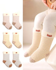 Neutral striped baby socks set with embroidered bear faces – soft breathable cotton