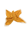 Orange cotton baby blanket with tassel trim, soft breathable newborn blanket for cot, stroller and nursery use.