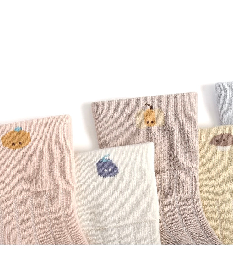 Set of socks with small animal illustrations on a white background