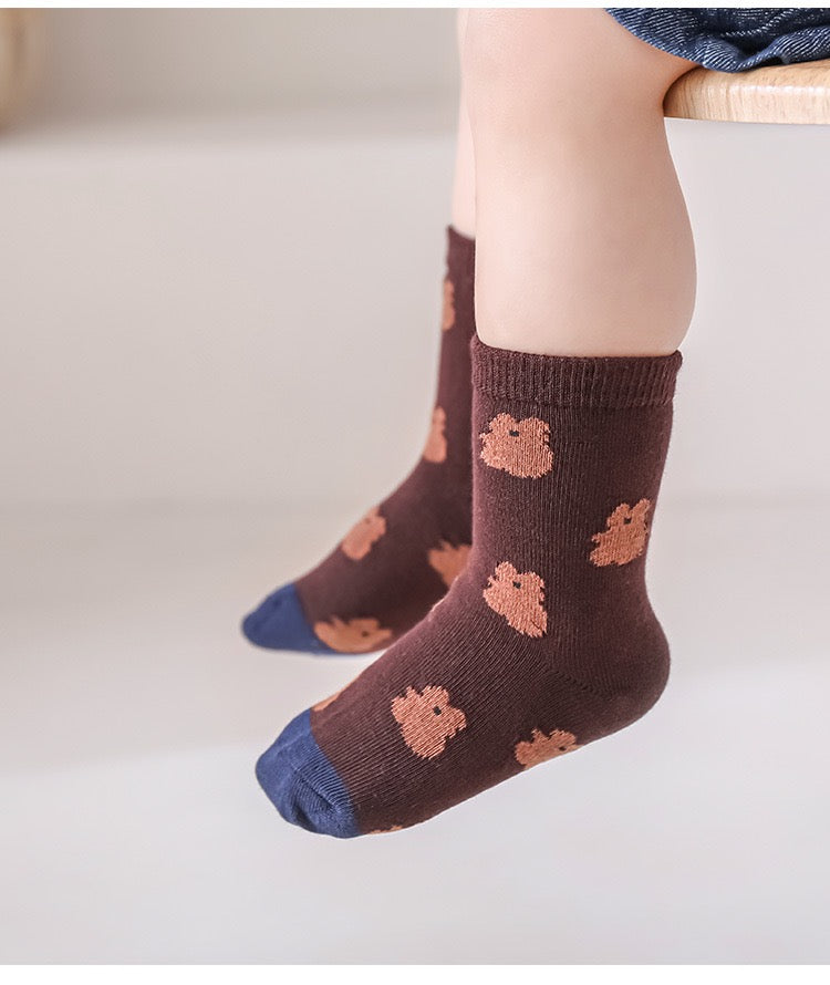 Baby wearing brown bear patterned cotton baby socks – soft cotton comfort
