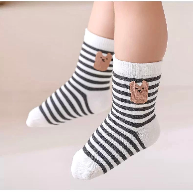 Baby wearing grey cotton socks with bear face design – toddler socks