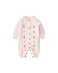 Front view of pink embroidered knit baby romper with button closure and floral design.