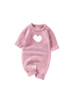 Soft pink knitted baby romper with white heart detail and long sleeves for girls and boys