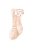 Soft pink lace mesh baby socks, cute and comfortable for baby girls.