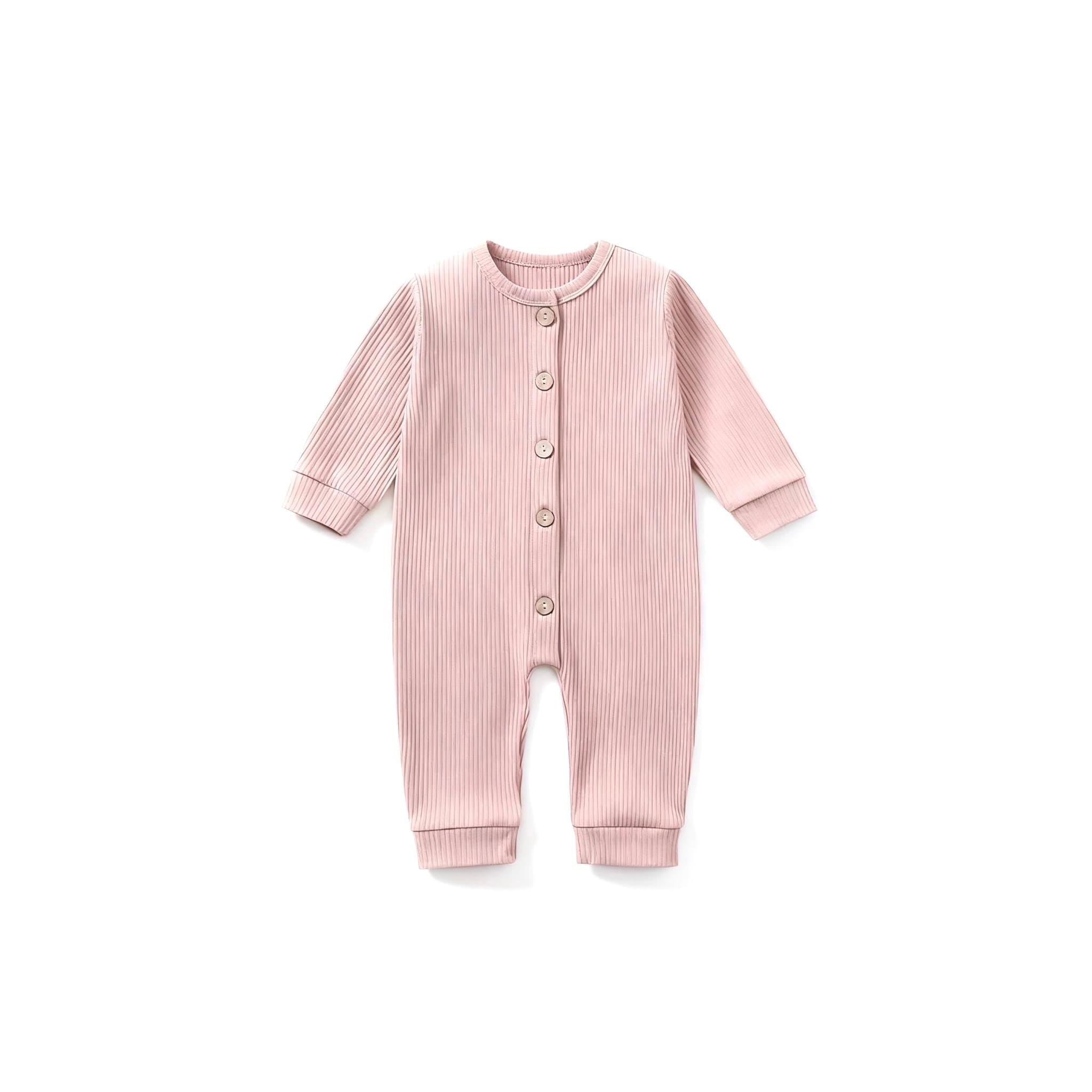 Soft pink ribbed cotton baby jumpsuit with button closure – gentle stretch knit for infants.