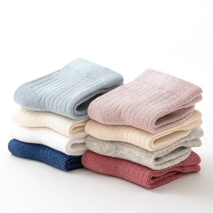 White ribbed baby socks close-up – soft breathable cotton material