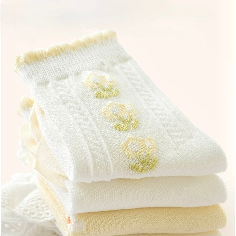 Cream floral baby socks with embroidered daisy details – soft breathable cotton socks