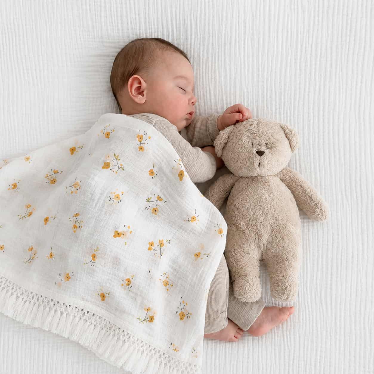 Sunflower print cotton baby blanket with tassel edging, lightweight breathable newborn blanket for cot, stroller and baby nursery.