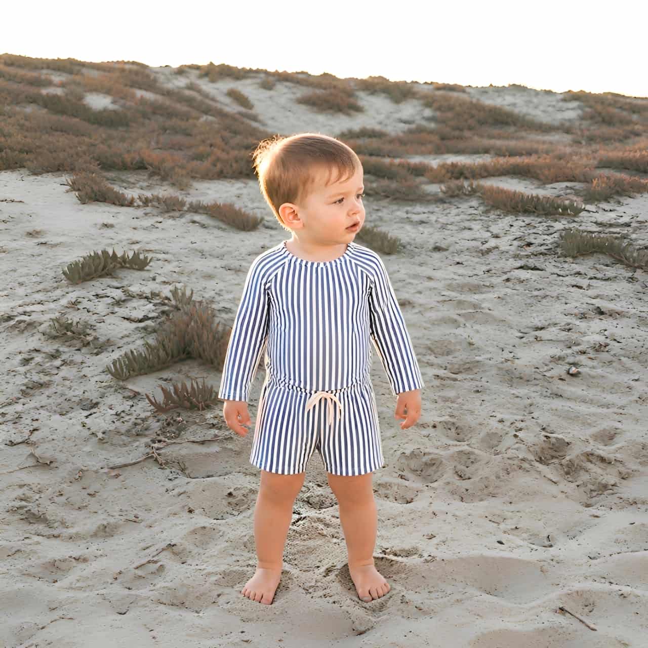 Toddler striped rash guard swim set in blue, two piece baby swimwear with long sleeve top and shorts for summer beach days