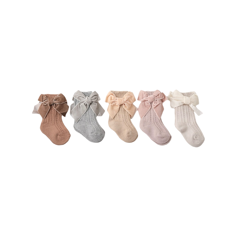 Set of five velvet bow baby socks in brown, grey, beige, pink, and cream — perfect baby gift set.