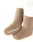 Warm brown cotton socks for toddlers with anti-slip grip sole
