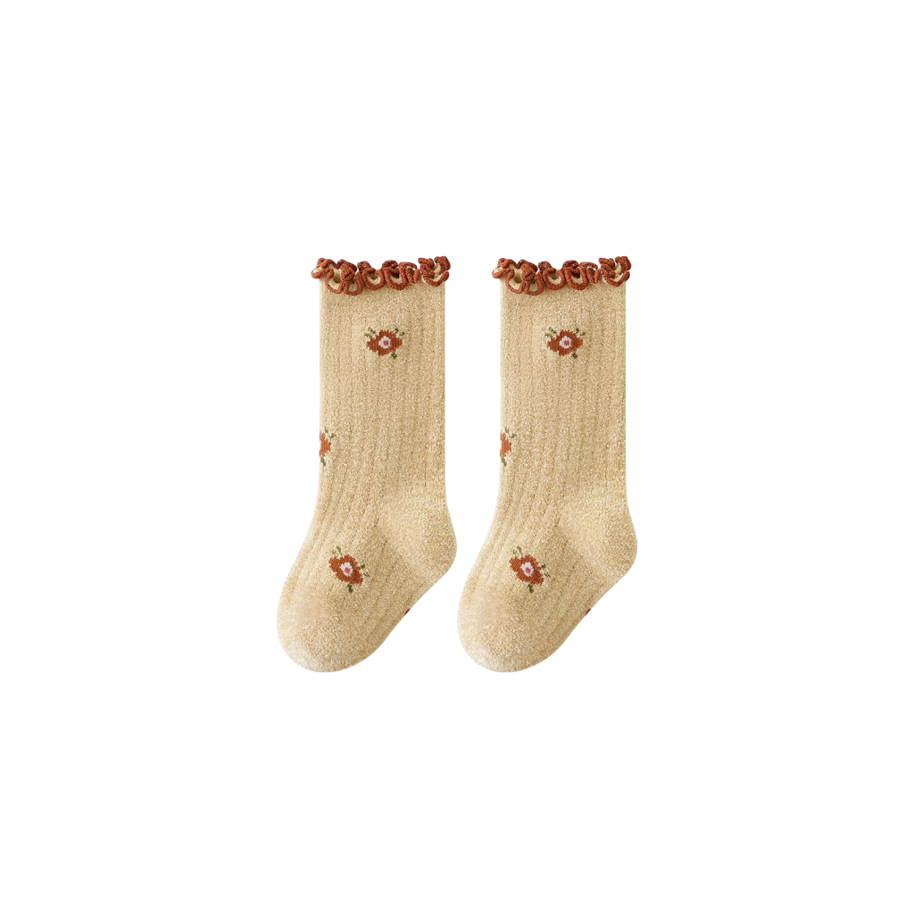 Yellow baby socks with embroidered daisies and soft ribbed design